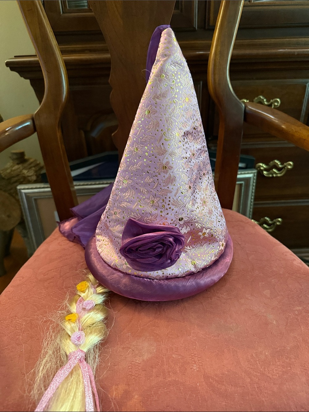 Disney Parks Princess Rapunzel hat with a veil and a braided hair extension.